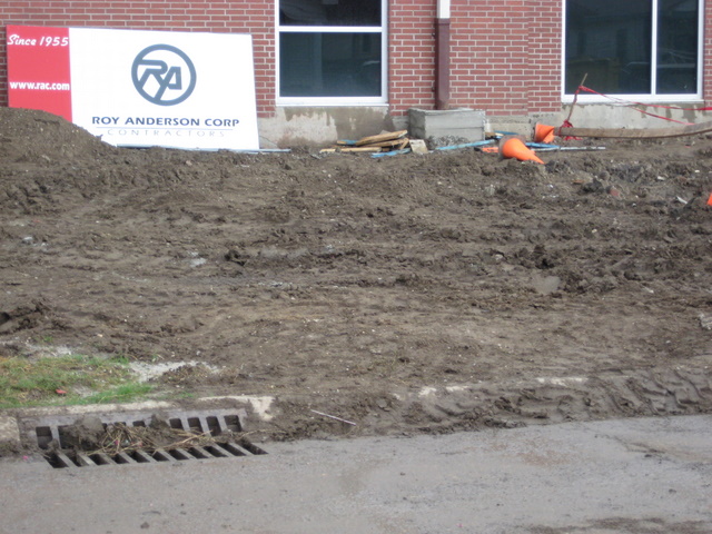 Mud flowing into storm drain at Langston Hughes School August 5, 2009